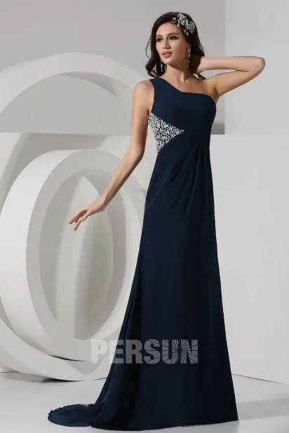 Robe noire longue à encolure asymétrique dos nu taille empire aux strass